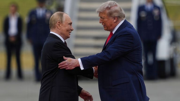 Mr Putin and Mr Trump shake hands at the Alaska summit. Pic: AP