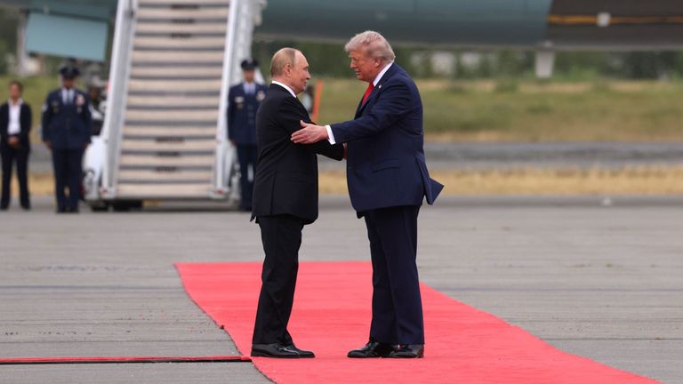 Mr Putin and Mr Trump greet each other on the red carpet in Alaska. Pic: Gavriil Grigorov/Sputnik/Pool/EPA/Shutterstock