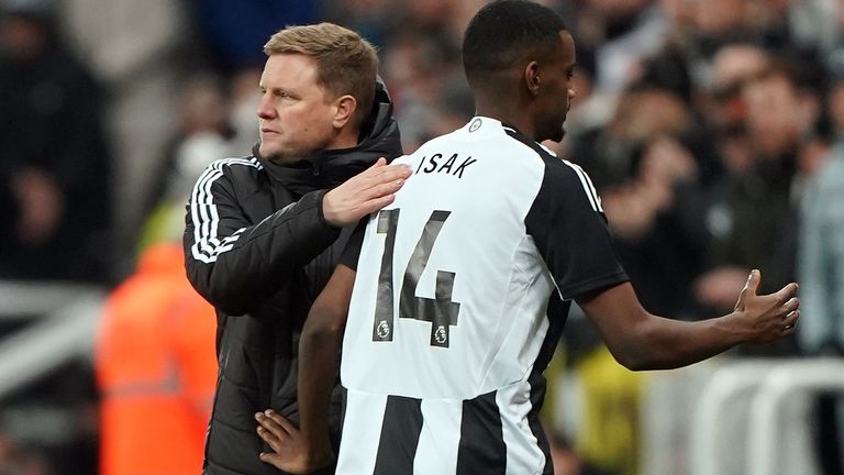 Newcastle head coach Eddie Howe (left) shakes hands with striker Alexander Isak during a Premier League match in January