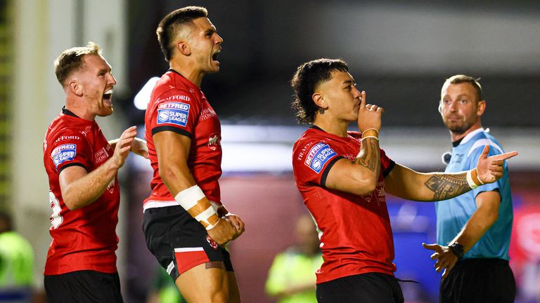 Tiaki Chan scores the 4th try and celebrates 