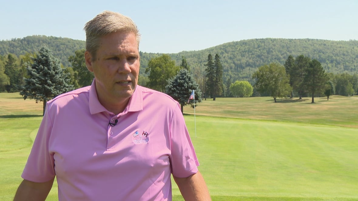 A man in a golfing shirt