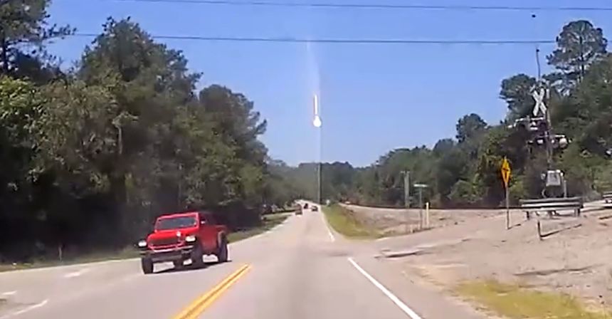 A still from dashcam video shows a big flash of light coming down from the sky in Lexington County, South Carolina, on June 26.