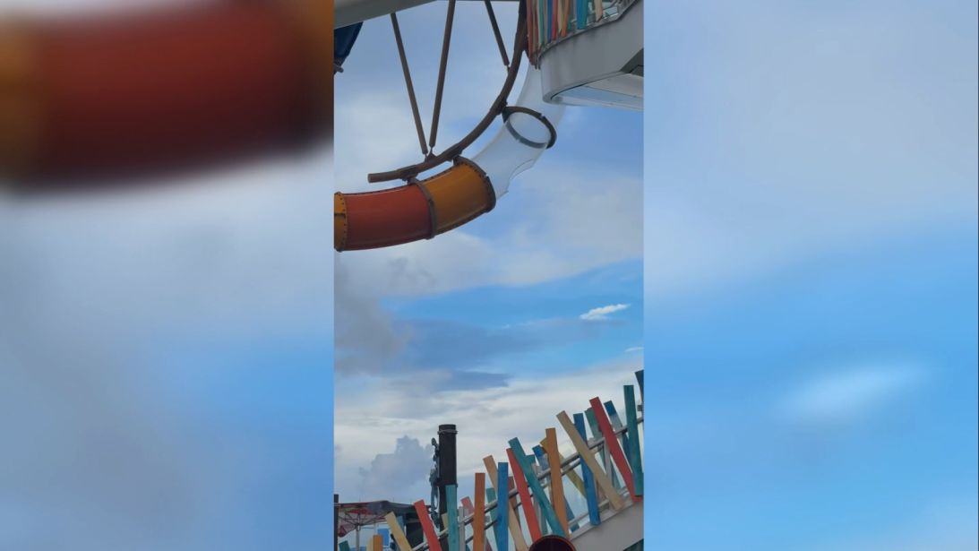 A photo taken by a cruise passengers shows a hole in an acrylic waterslide on Icon of the Seas.