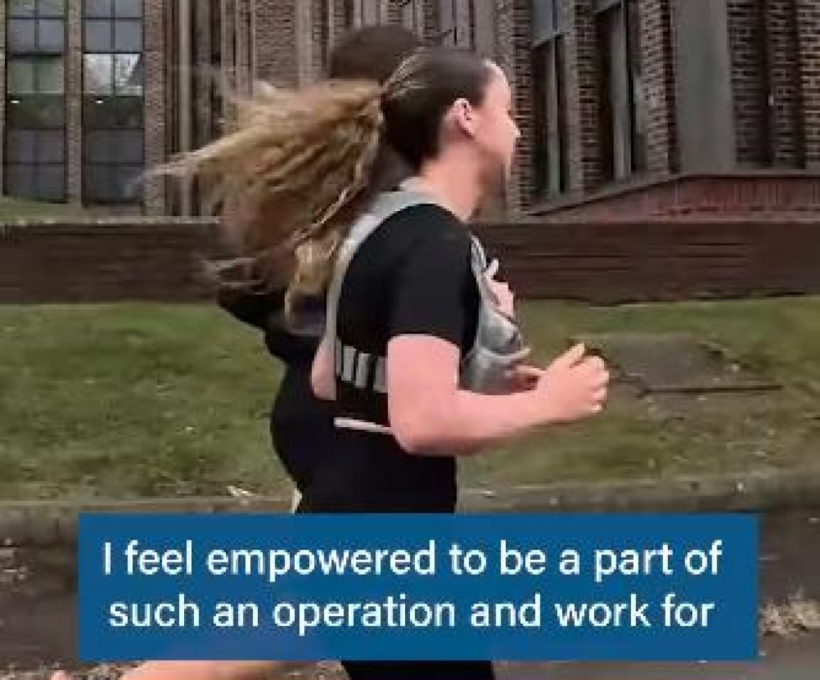 A screen shot that shows two women running, with text overlay that says 'I feel empowered to be part of such an operation.'