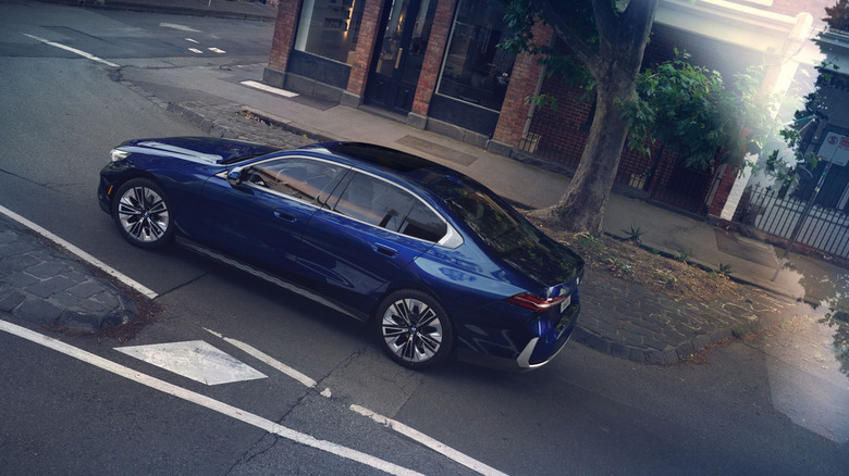 A BMW 530i sedan on a city street
