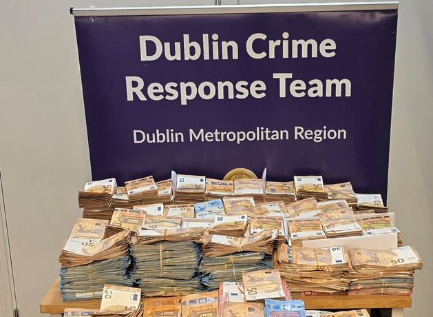 Three men arrested and €1.2m in cash seized in Dublin as part of probe into organised crime group