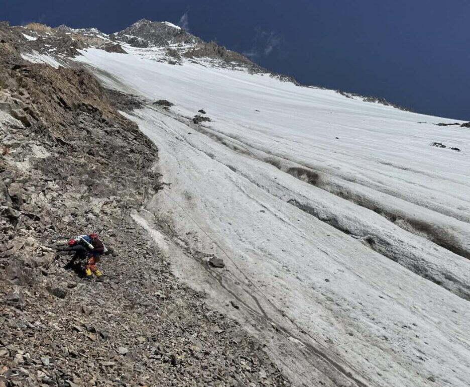 a climber on a very steep slope on K2