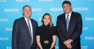 Left to right: Brian Friedman of Jefferies Capital Partners, Wesley LePatner of Blackstone, Eric S. Goldstein of UJA-Federation of New York at a Dec. 2023 gala event.