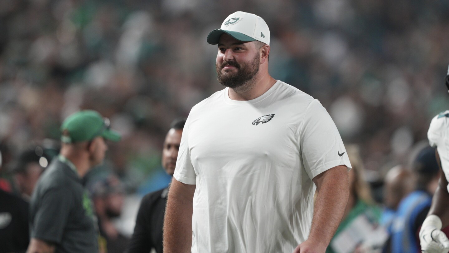 Eagles guard Landon Dickerson is carted off with leg injury