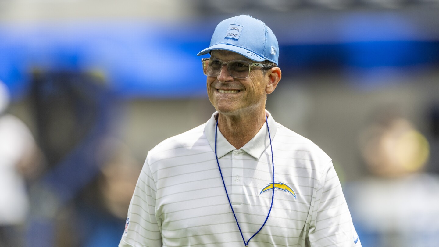 NCAA imposes 10-year "show cause" order on Jim Harbaugh