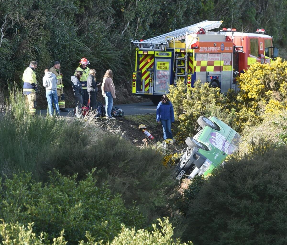 Van rolls off high peninsula road
