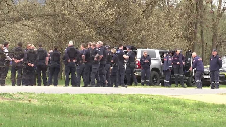 Victoria police officers in Porepunkah following yesterdays shooting. 