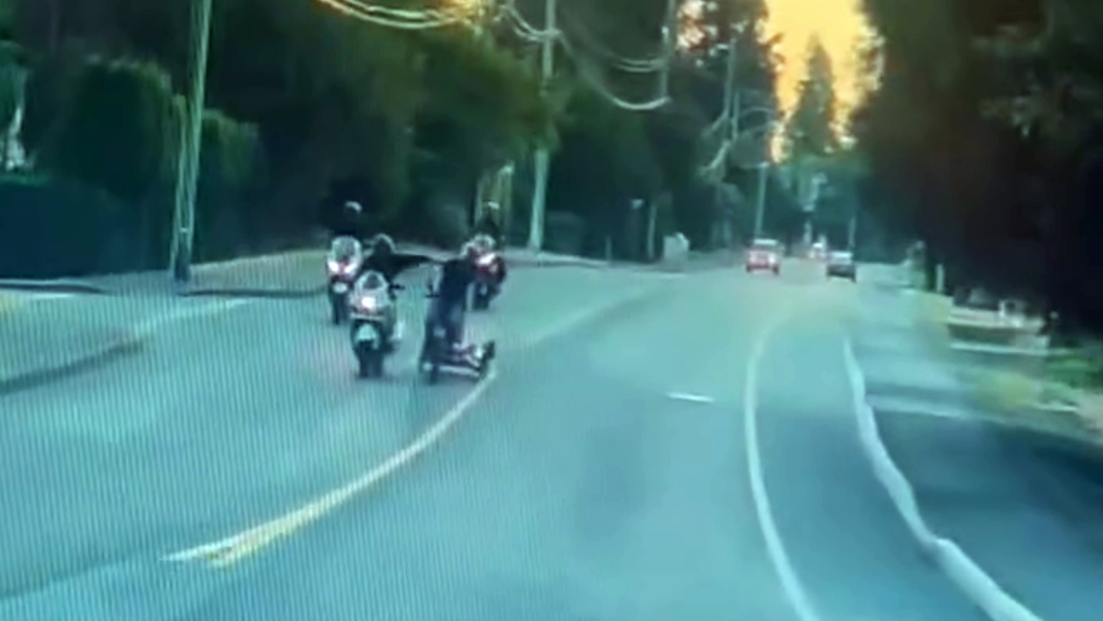 Cyclist shoved across traffic lane by passing motorcyclist in shocking Nanaimo video