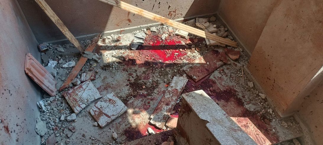 The bloodied staircase at Nasser Hospital in Gaza after an Israeli 