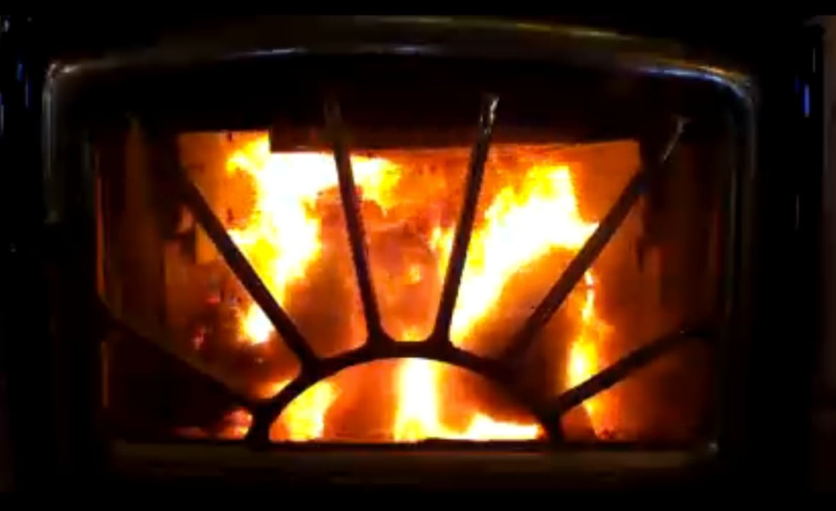 An up-close picture of a wood stove.