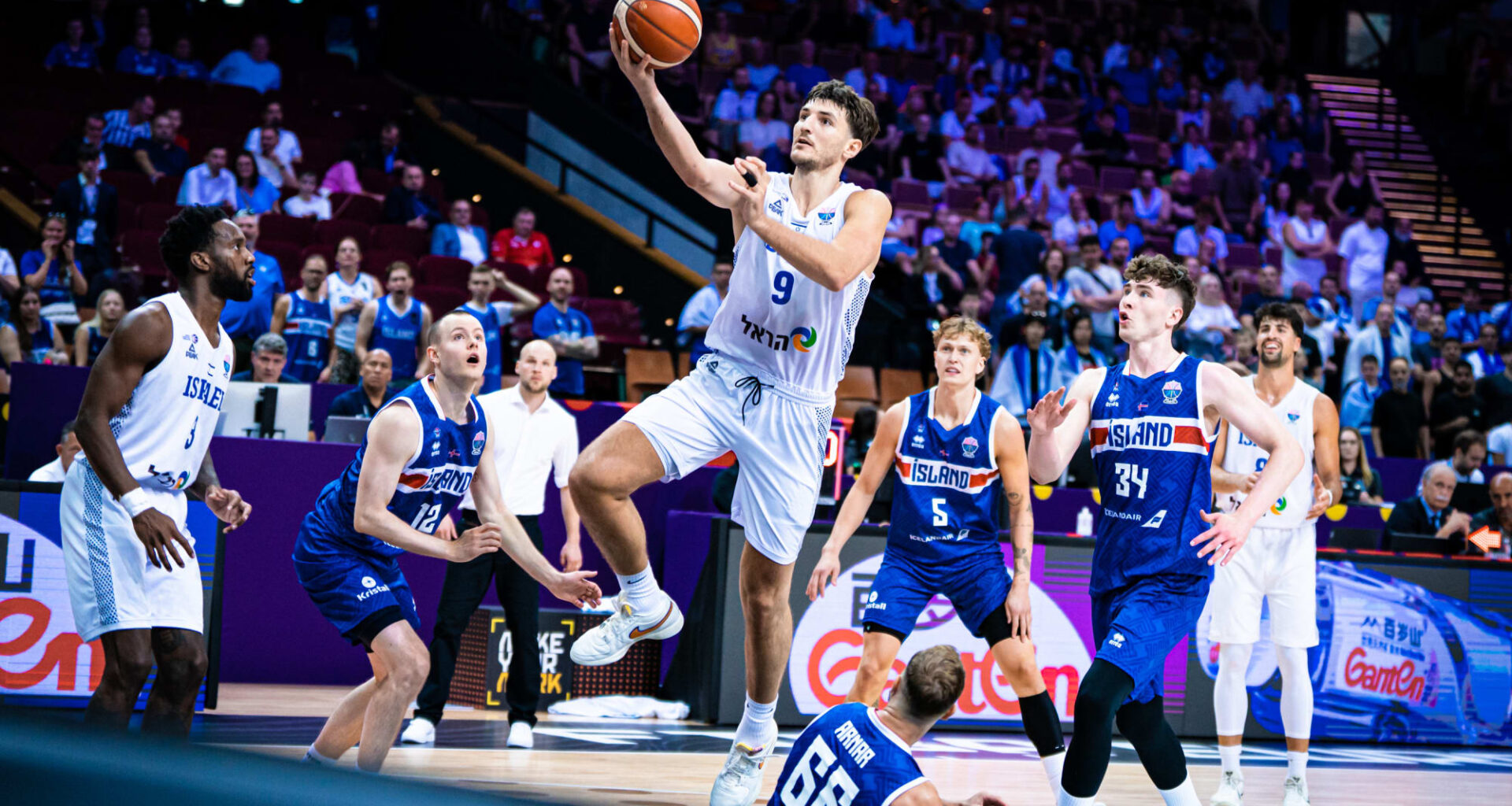 Israel pull away from feisty Iceland for Group D opener win