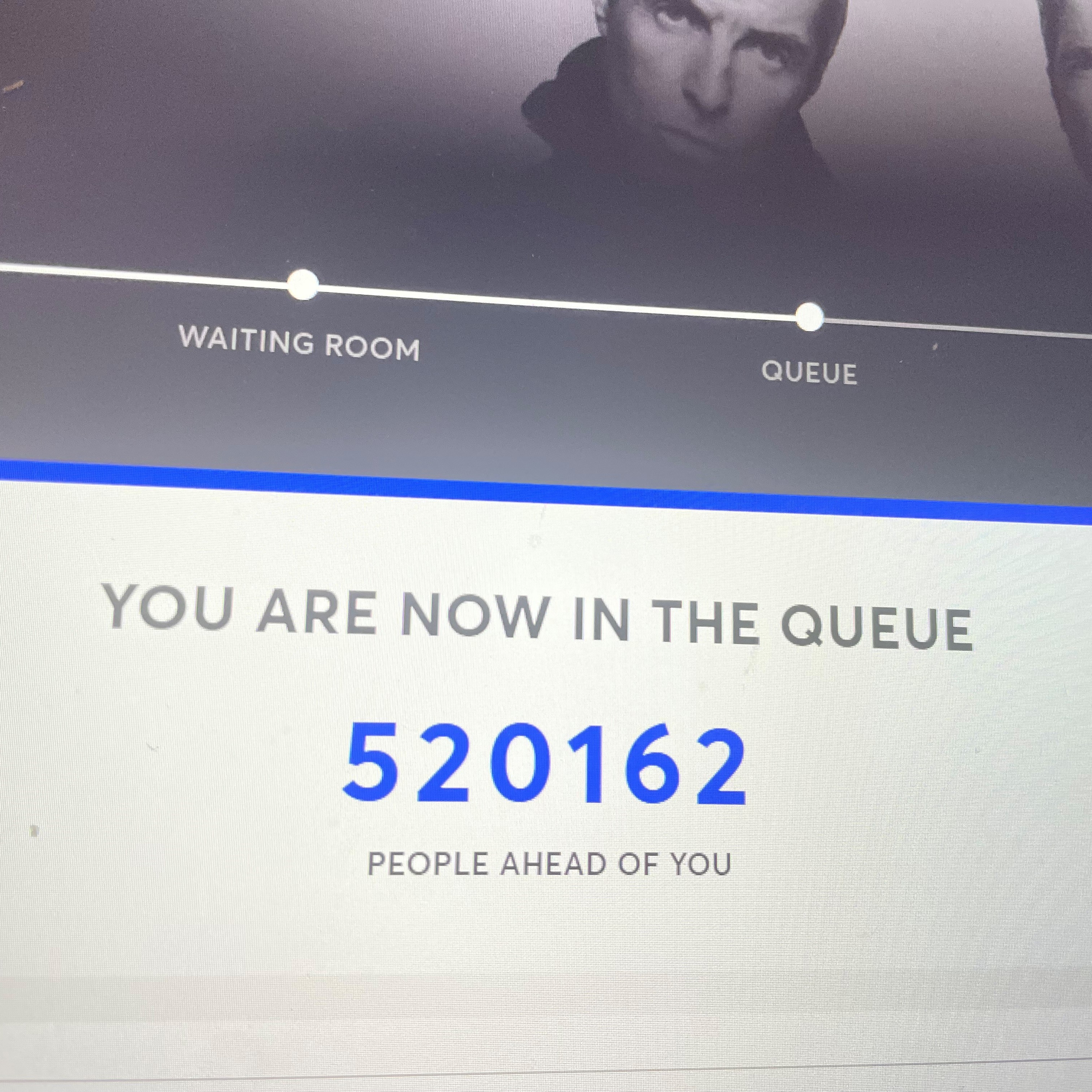 A screenshot from Ticketmaster.ie showing a virtual waiting room with "520162 PEOPLE AHEAD OF YOU" in the queue for Oasis reunion concert tickets.