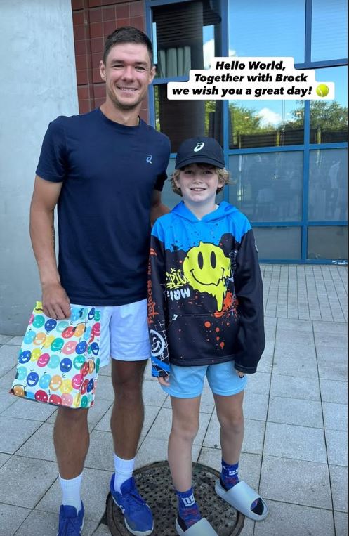 Kamil Majchrzak and a boy.