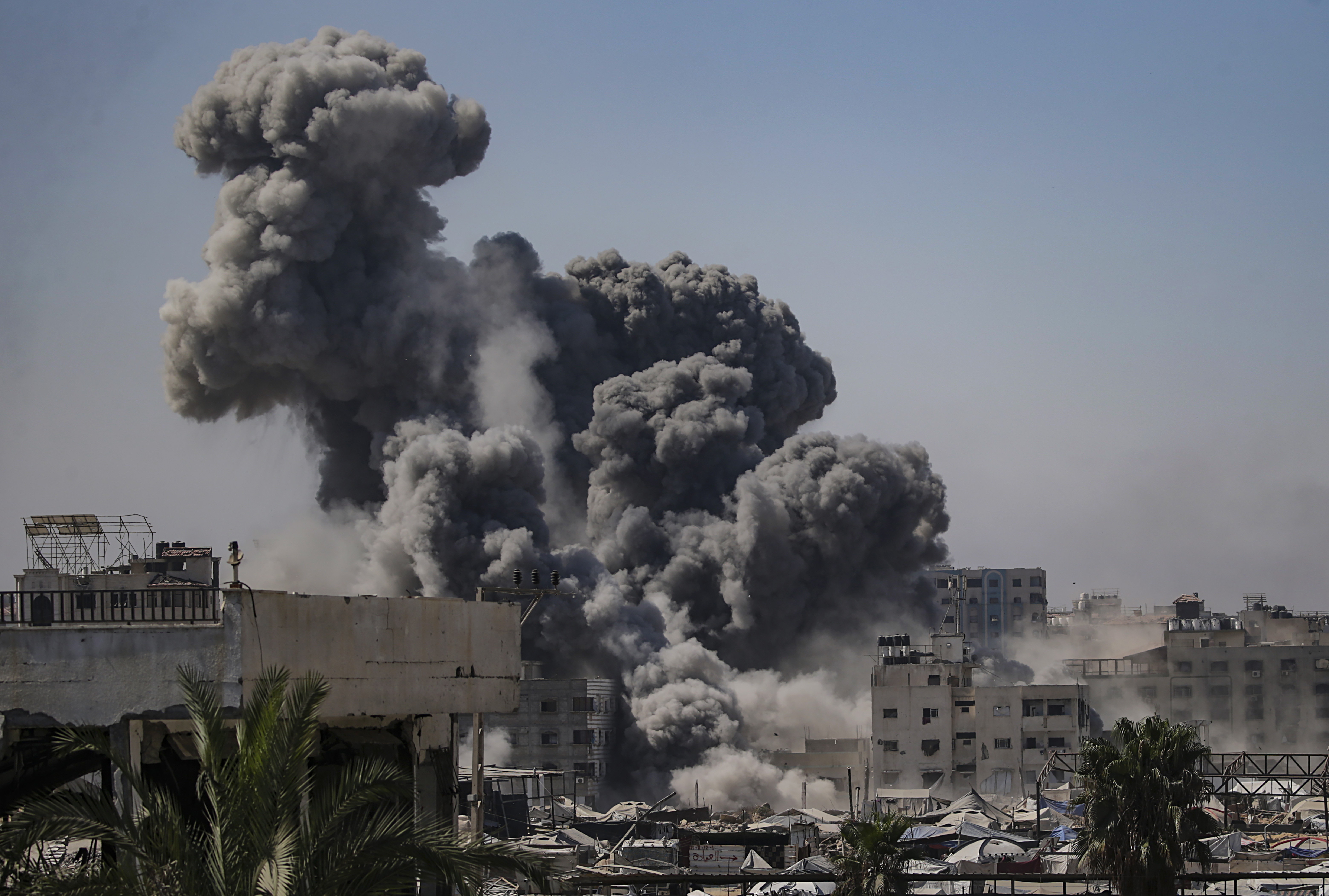 Smoke rises from an Israeli airstrike in Gaza City.
