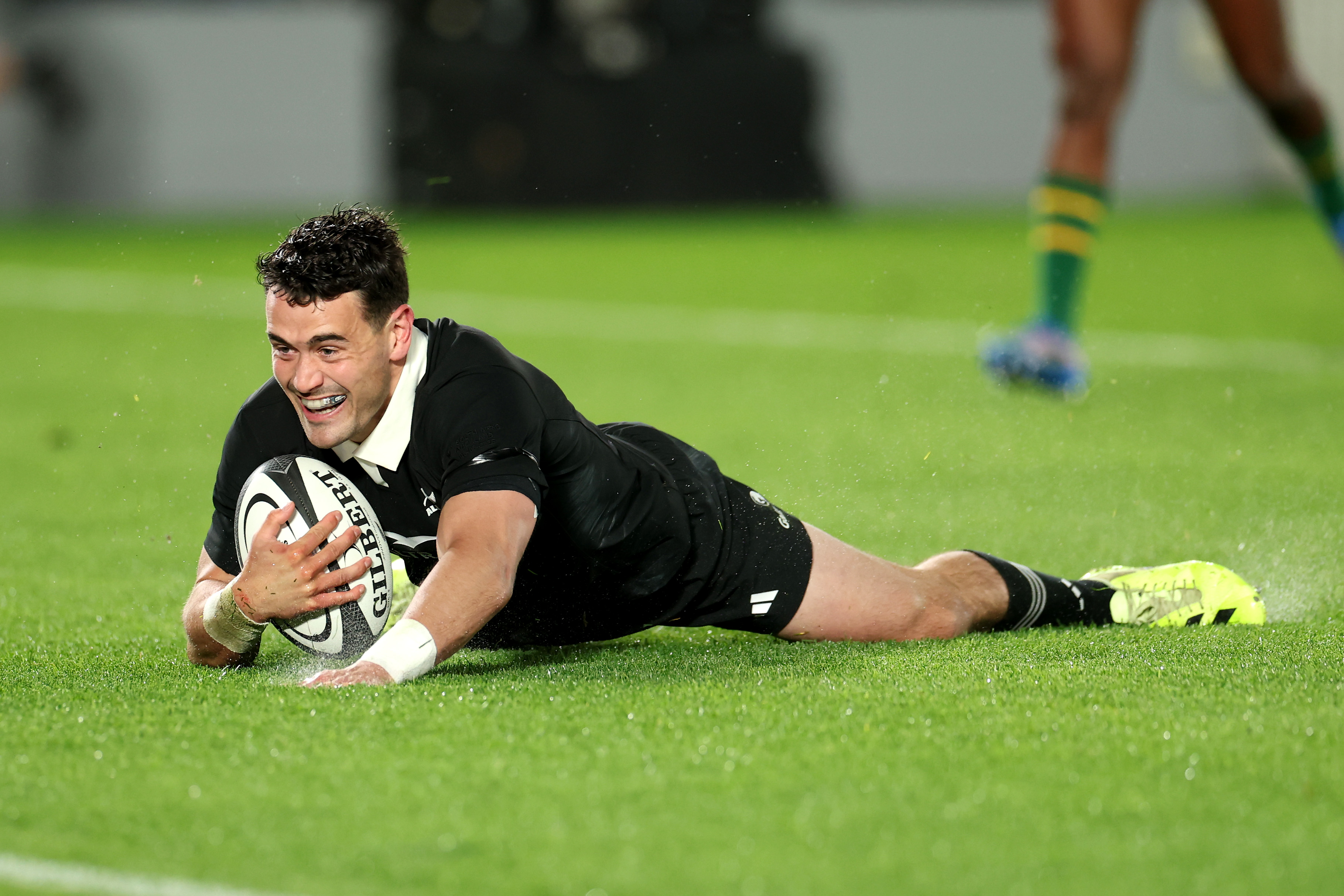Will Jordan of the New Zealand All Blacks scoring a try.