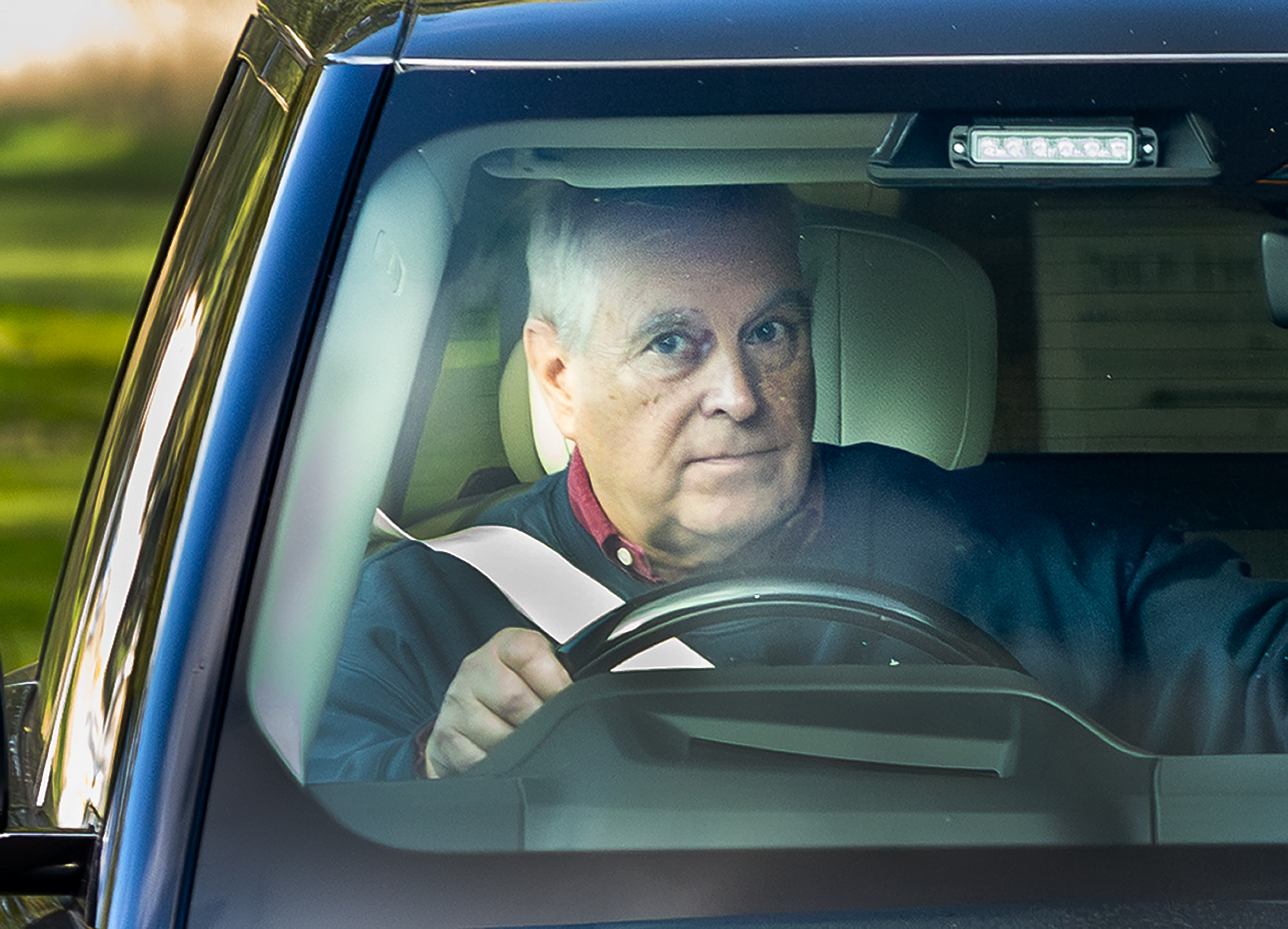 Prince Andrew, Duke of York, driving from Royal Lodge at Windsor.