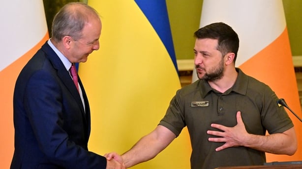 Ukrainian President Volodymyr Zelensky (R) shakes hands with Ireland's Taoiseach (Prime Minister) Micheal Martin at the end of their press conference following their talks in Kyiv on July 6, 2022