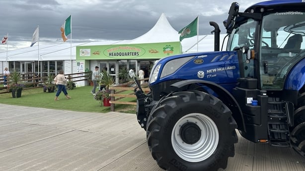 A tractor parked beside a marquee at the launch of the National Ploughing Championships.
