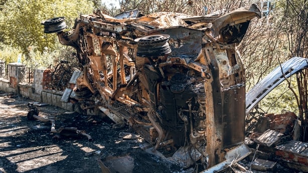 SUMY, UKRAINE - SEPTEMBER 2: A car destroyed by the blast lies on its side after the Russian drone attack on September 2, 2025 in Sumy, Ukraine. On the night of September 2, the Russian army attacked the city with strike drones. The attack damaged civilian infrastructure, shattered windows in reside