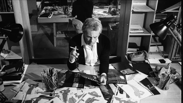 Italian fashion designer Giorgio Armani, born in Piacenza in 1935, examines drawings for new designs. (Photo by David Lees/Corbis/VCG via Getty Images)