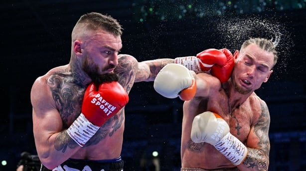Lewis Crocker, left, and Paddy Donovan during their IBF World Welterweight title bout at Clearer Twist National Football Stadium at Windsor Park in Belfast.
