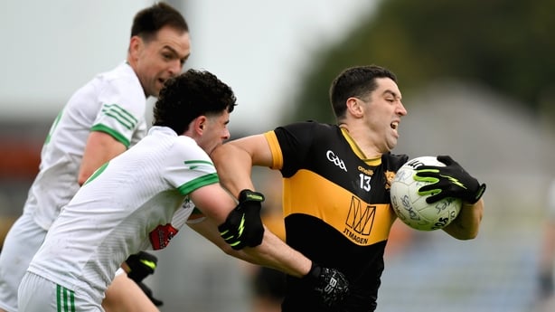 14 September 2025; Tony Brosnan of Dr Crokes is tackled by Jack Doyle of Na Gaeil during the Kerry County Senior Club Football Championship final match between Dr Crokes and Na Gaeil at Austin Stack Park in Tralee, Kerry. Photo by Brendan Moran/Sportsfile