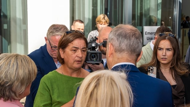 Antoinette Burke (right), mother of Katie Burke from Cobh, confronts Taoiseach Micheal Martin