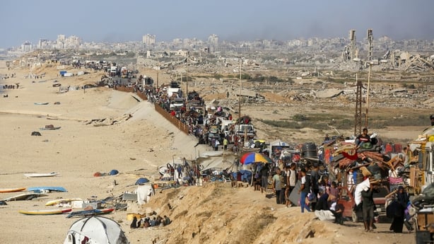 GAZA CITY, GAZA - SEPTEMBER 16: Palestinians flee toward southern Gaza via al-Rashid Street after intensified Israeli attacks and evacuation orders in the northern Gaza Strip on September 16, 2025. (Photo by Stringer/Anadolu via Getty Images)