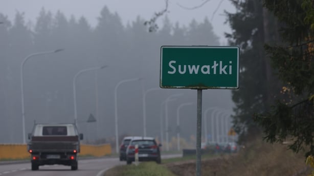 SUWALKI, POLAND - OCTOBER 28: Traffic passes a town limits sign for Suwalki on October 28, 2022 in Suwalki, Poland. Suwalki is the namesake for the strategically vital Suwalki Gap, an approximately 70km long stretch of land along the Lithuanian and Polish border between Kaliningrad and Russia-loyal 
