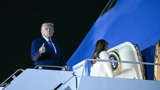 US President Donald Trump and First Lady Melania Trump board Air Force One