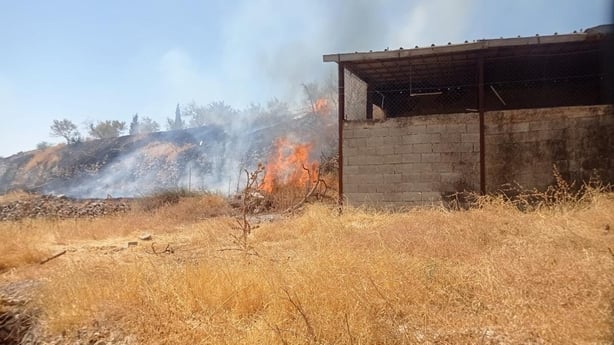 Settlers set fire to farm buildings in Taybeh in the West Bank 
