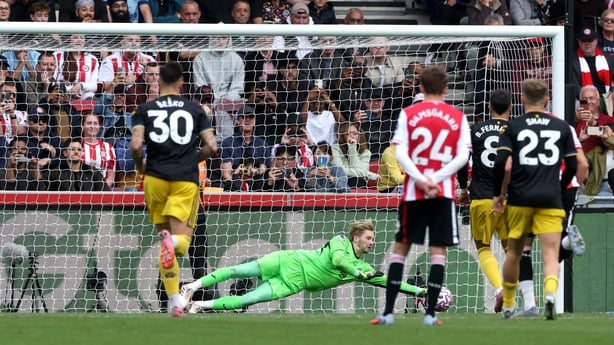 Caoimhin Kelleher of Brentford saves a penalty kick