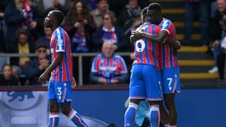 Ismaila Sarr of Crystal Palace celebrates scoring his team's first goal with teammate Marc Guehi during the Premier League match between Crystal Palace and Liverpool at Selhurst Park on September 27, 2025 in London, England.