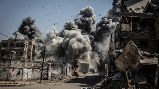 Smoke rises from the area targeted by Israeli forces in Gaza City
