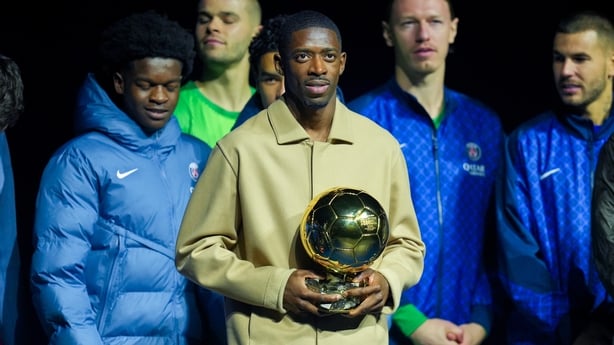 Ousmane Dembele of PSG shows the Ballon d'or following the Ligue 1 McDonald's match between Paris Saint-Germain FC and AJ Auxerre at Parc des Princes on September 27, 2025 in Paris, France.