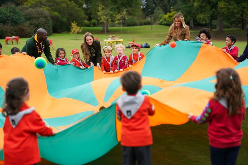 Catherine, Princess of Wales and US first lady Melania Trump play with children as they tour Frogmore Cottage during the US state visit in Windsor, England, on September 18, 2025.