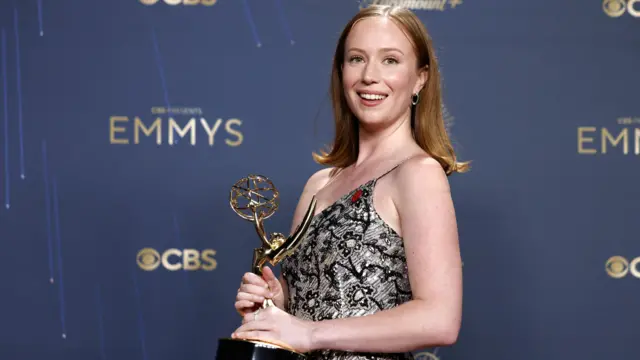 annah Einbinder posses with the award for Supporting Actress in a Comedy Series for 'Hacks'