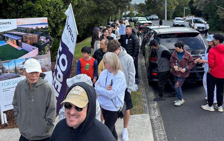 Alex and Corban Walls's trophy home on Island Bay Road, in Beach Haven, Auckland, sold under the hammer today after strong biddding. Photo / Supplied