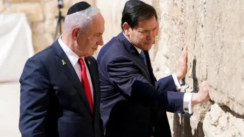 Reuters US Secretary of State Marco Rubio and Israeli Prime Minister Benjamin Netanyahu visit the Western Wall