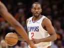 Kawhi Leonard of the L.A. Clippers handles the ball during Game 1 of the Western Conference playoffs against the Phoenix Suns.