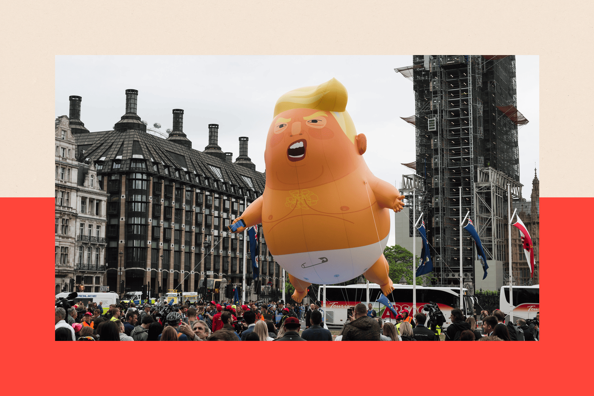 Image of the inflatable effigy of Trump wearing a baby's nappy, pictured in a London street