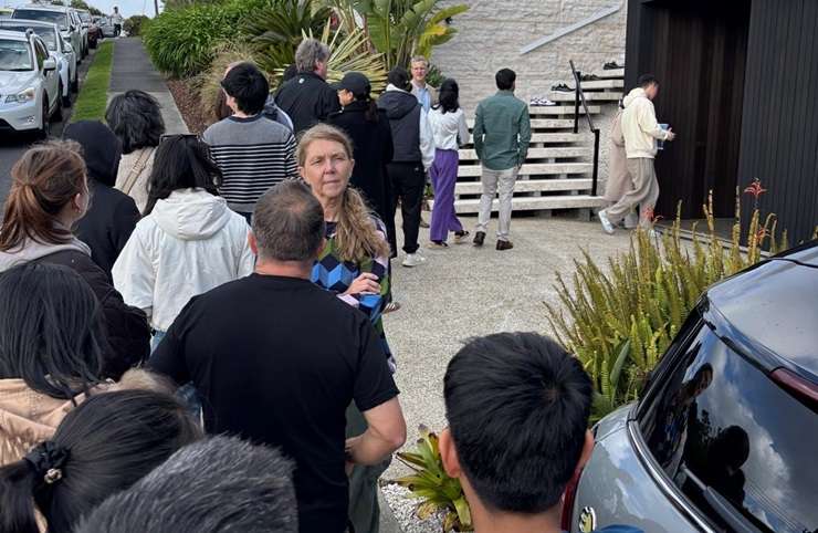 Crowds line up to see the house built by Love It Or List It star Alex Walls and her engineer husband, Corban. Photo / Supplied