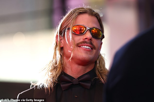 Also making waves on the Brownlow red carpet was AFL megastar Bailey Smith (pictured), who arrived wearing a very trendy accessory - but it wasn't his rumoured love interest Tammy Hembrow