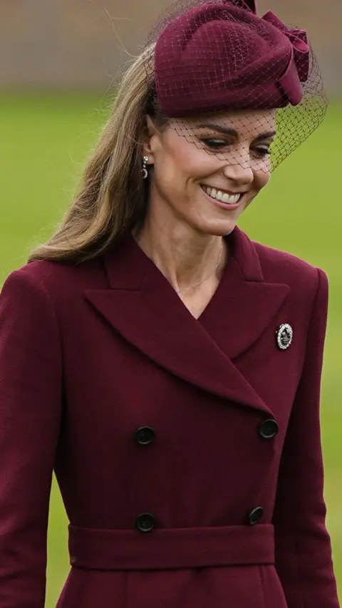 Getty Images Catherine, Princess of Wales, smiles as she greets their guests on the Windsor Estate, in Windsor