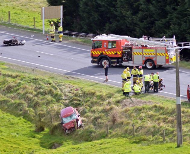 The car and motorcycle involved in the crash. Photo: Gerard O'Brien